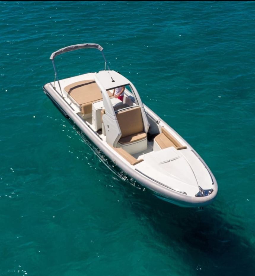 Expression speedboat cruising across deep blue Adriatic water